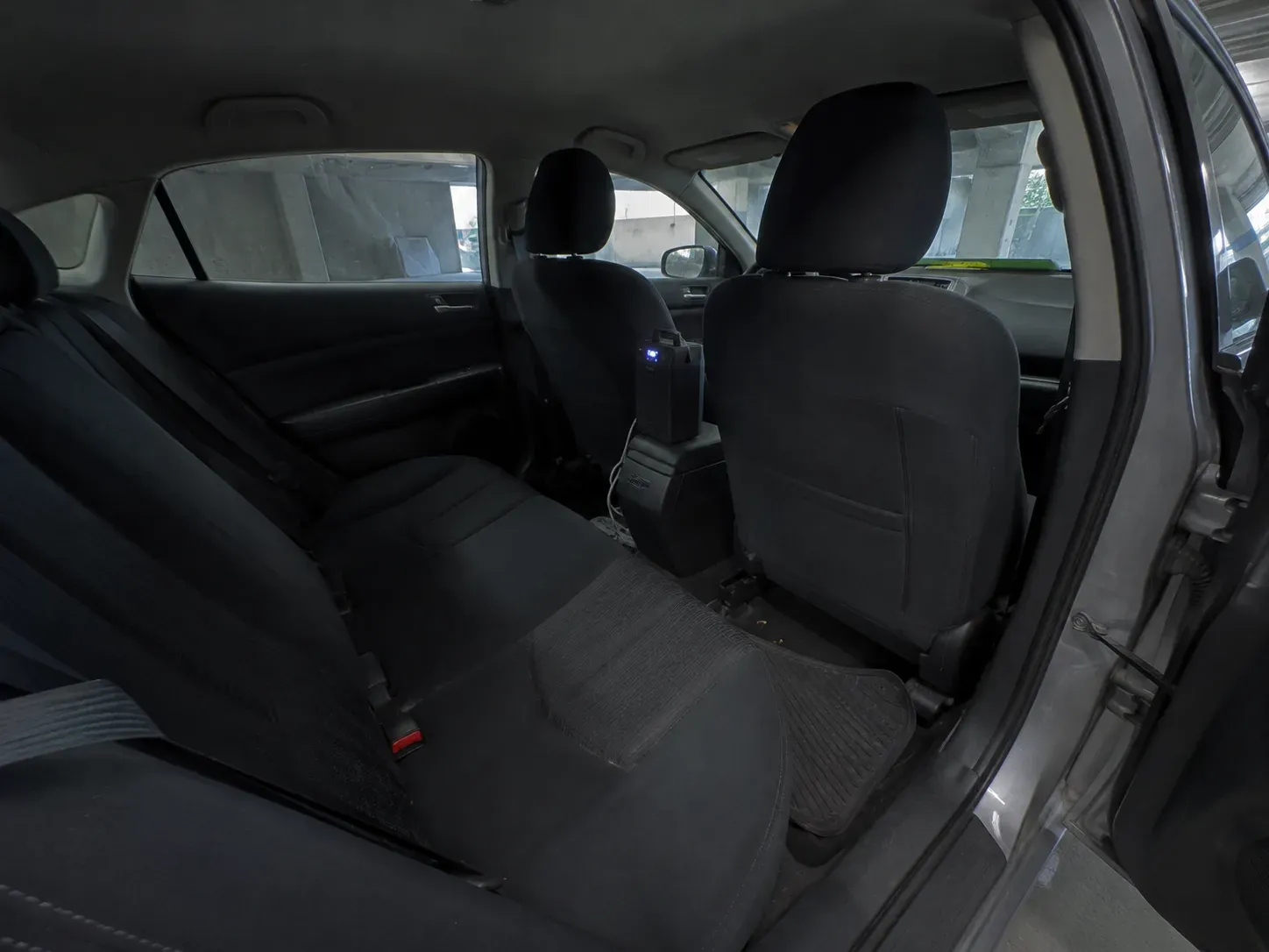 Odor removal treatment placed inside a car in Irving